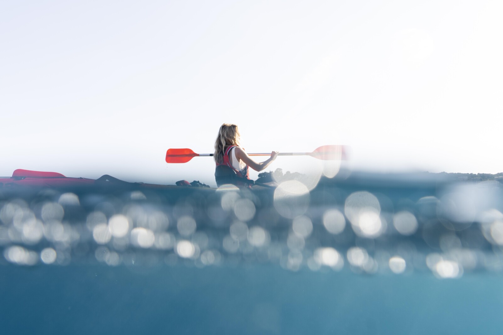 young-beautiful-woman-traveling-by-canoe